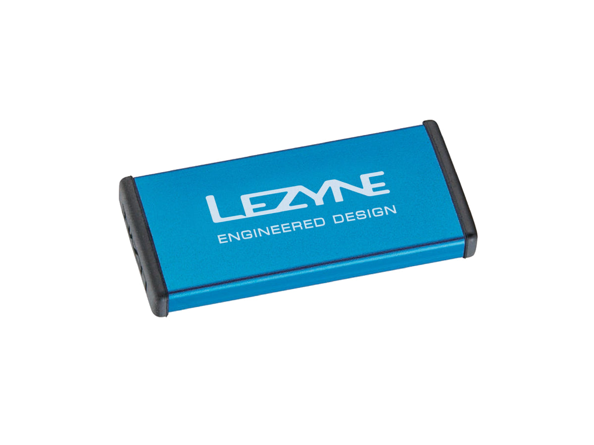 "Lezyne Metal Kit Puncture Patches in blue case with self-adhesive patches for compact and efficient bicycle tire repair"








